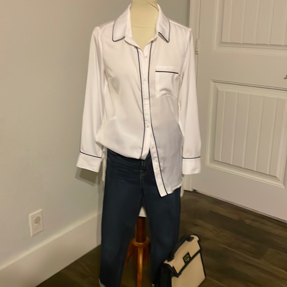White button up shirt with navy blue detail. Size S